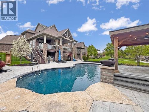 16 Westlake Boulevard, Brantford, ON - Outdoor With In Ground Pool With Deck Patio Veranda