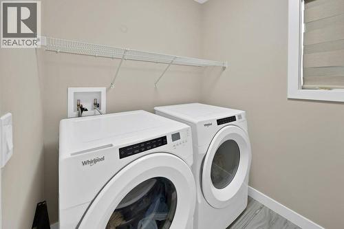 93 Saddlestone Place Ne, Calgary, AB - Indoor Photo Showing Laundry Room