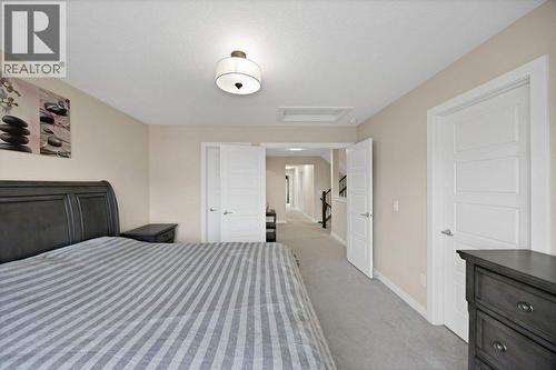 93 Saddlestone Place Ne, Calgary, AB - Indoor Photo Showing Bedroom