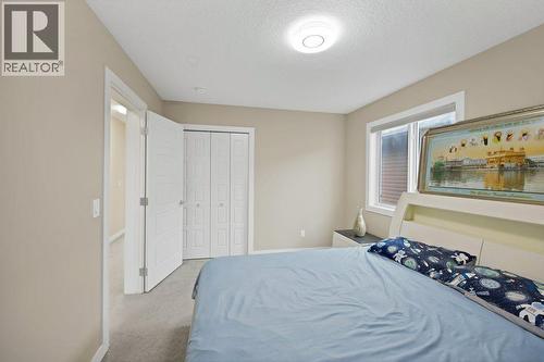 93 Saddlestone Place Ne, Calgary, AB - Indoor Photo Showing Bedroom