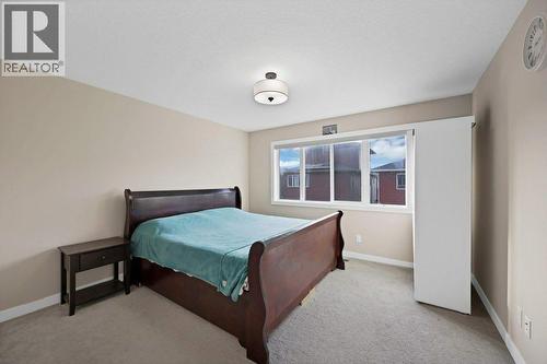 93 Saddlestone Place Ne, Calgary, AB - Indoor Photo Showing Bedroom