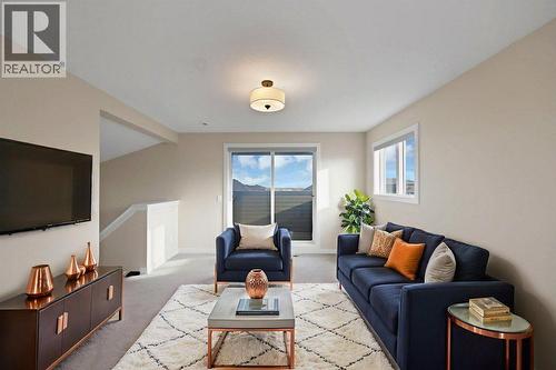 93 Saddlestone Place Ne, Calgary, AB - Indoor Photo Showing Living Room