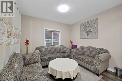 93 Saddlestone Place Ne, Calgary, AB - Indoor Photo Showing Living Room