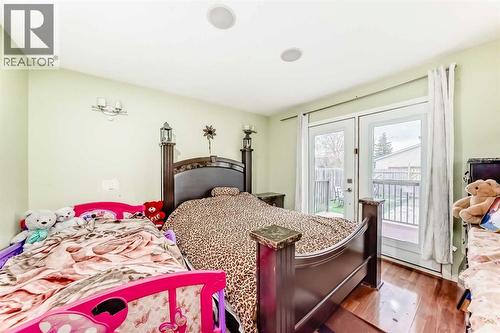 Master - 707 Malvern Drive Ne, Calgary, AB - Indoor Photo Showing Bedroom