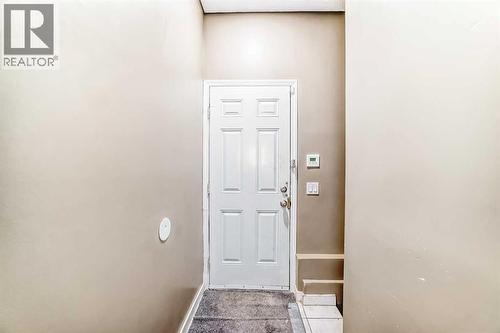 Walk up Door - 707 Malvern Drive Ne, Calgary, AB - Indoor Photo Showing Other Room