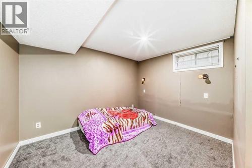 Basement Bedroom - 707 Malvern Drive Ne, Calgary, AB - Indoor