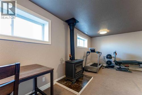 21054 A Range Road 264, Cardston, AB - Indoor Photo Showing Gym Room