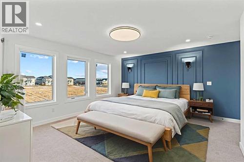 8 Ranchers Meadows, Okotoks, AB - Indoor Photo Showing Bedroom