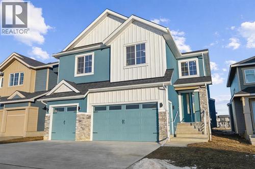 8 Ranchers Meadows, Okotoks, AB - Outdoor With Facade