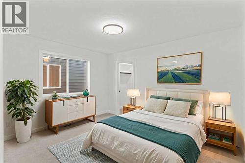 8 Ranchers Meadows, Okotoks, AB - Indoor Photo Showing Bedroom