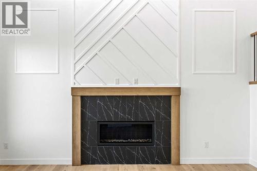 8 Ranchers Meadows, Okotoks, AB - Indoor With Fireplace