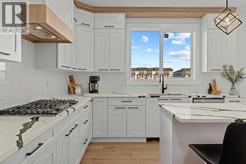 8 Ranchers Meadows, Okotoks, AB - Indoor Photo Showing Kitchen With Upgraded Kitchen