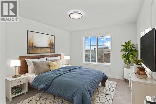8 Ranchers Meadows, Okotoks, AB - Indoor Photo Showing Bedroom