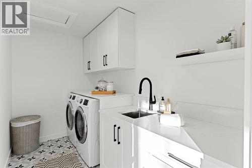 8 Ranchers Meadows, Okotoks, AB - Indoor Photo Showing Laundry Room