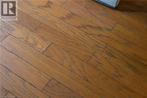 Detailed view of wood finished floors - 23 Frederick Avenue, Hamilton, ON -  Photo Showing Other Room