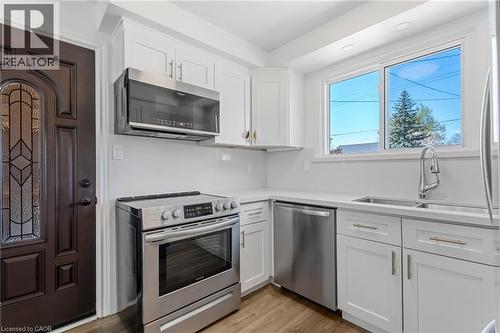 879 Upper Sherman Avenue, Hamilton, ON - Indoor Photo Showing Kitchen With Double Sink