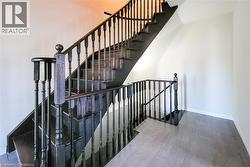 Staircase featuring baseboards - 