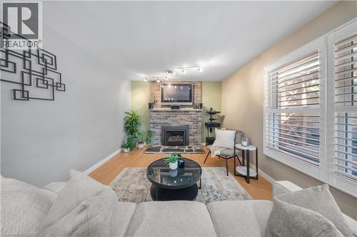 54 Pathfinder Crescent, Kitchener, ON - Indoor Photo Showing Living Room With Fireplace