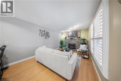 54 Pathfinder Crescent, Kitchener, ON - Indoor Photo Showing Living Room With Fireplace