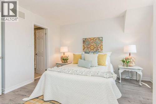 Primary Bedroom with baseboards and light wood-type flooring - 386 Linden Drive, Cambridge, ON - Indoor Photo Showing Bedroom