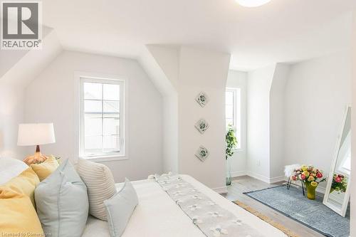 Primary Bedroom with light wood-type flooring and baseboards - 386 Linden Drive, Cambridge, ON - Indoor Photo Showing Bedroom