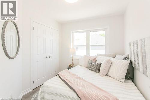 Bedroom with a closet and wood finished floors - 386 Linden Drive, Cambridge, ON - Indoor Photo Showing Bedroom