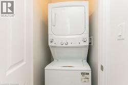 Laundry Closet with stacked washer / dryer - 