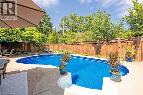 275 Alexander Court, Burlington, ON - Outdoor With In Ground Pool With Deck Patio Veranda With Backyard