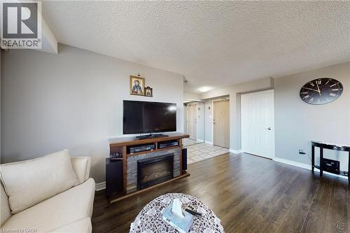 432 Main Street Unit# 1002, Hamilton, ON - Indoor Photo Showing Living Room With Fireplace