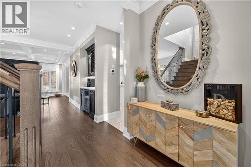 Hall with crown molding, recessed lighting, coffered ceiling, beamed ceiling, and dark wood-style flooring - 18 David Avenue, Hamilton, ON - Indoor