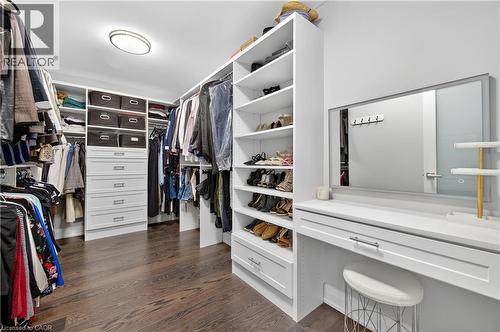 Walk in closet with dark wood-type flooring - 18 David Avenue, Hamilton, ON - Indoor With Storage