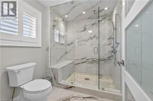 Bathroom with a marble finish shower and marble finish floors - 18 David Avenue, Hamilton, ON - Indoor Photo Showing Bathroom