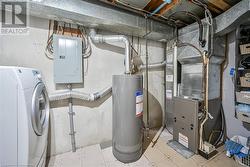 Utility room with laundry area - 