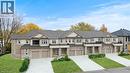 View of front of house with a front lawn, driveway, stucco siding, a residential view, and roof with shingles - 13 Davinci Boulevard, Hamilton, ON  - Outdoor With Facade 