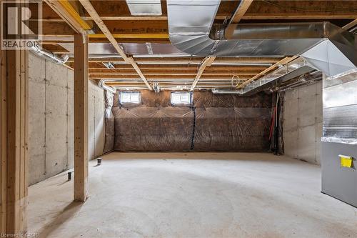Below grade area featuring heating unit - 13 Davinci Boulevard, Hamilton, ON - Indoor Photo Showing Basement
