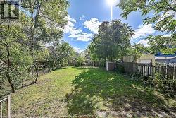 View of fenced backyard - 