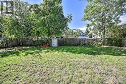 View of fenced backyard - 