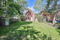 Back of house with a chimney - 