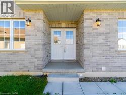 Entrance to property with brick siding - 