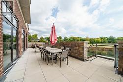 View of patio featuring outdoor dining space - 