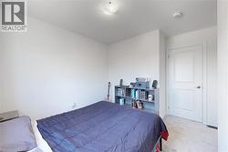 Bedroom with carpet and baseboards - 