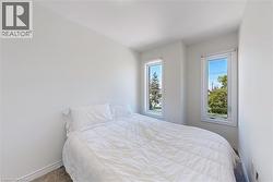 Bedroom with baseboards and carpet flooring - 