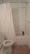 Full bathroom with shower / tub combo and vanity - 
