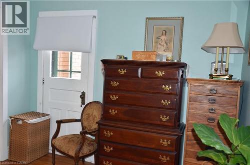 Walk through from Primary and door leading out to balcony - 25 Fairmount Avenue, Hamilton, ON - Indoor