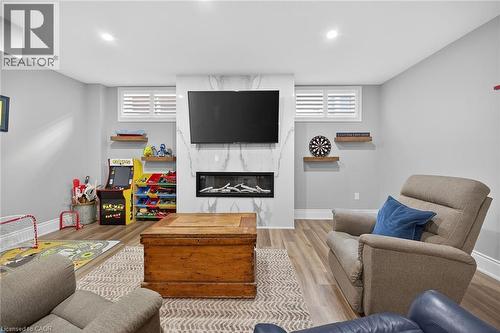 248 Cloverleaf Drive, Ancaster, ON - Indoor Photo Showing Basement With Fireplace