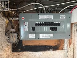 Utility room with electric panel - 