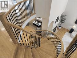 Stairs featuring wood finished floors - 