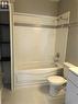 Full bathroom featuring tile patterned floors, shower / bath combination, and vanity - 552 7Th Avenue, Hanover, ON  - Indoor Photo Showing Bathroom 