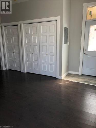 Entryway featuring dark wood finished floors and electric panel - 552 7Th Avenue, Hanover, ON - Indoor Photo Showing Other Room