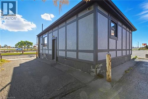 View of home's exterior featuring crawl space - 1036 Upper Wentworth Street, Hamilton, ON 